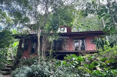 Casa em condomínio fechado com 3 quartos para alugar na rua laurindo januário da silveira, 1582, lagoa da conceição, florianópolis, 110 m2 por r$ 6.000