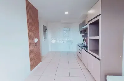 Apartamento com 2 quartos para alugar na Rua Arcanjo Cândido da Silva, 702, Praia de Fora, Palhoça, 50 m2 por R$ 1.800