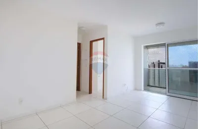 Apartamento de 60m com 2 quartos, sendo 1 suíte, varanda e cozinha. 1 Vaga de garage, lazer completo. Andar Alto.