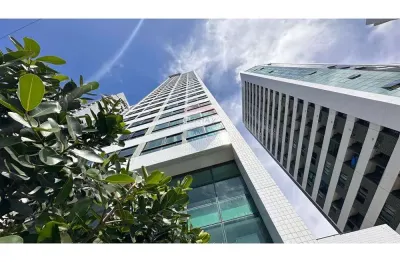 Apartamento beira mar com 2/4 mobiliado na nova barra - edf. barra classic