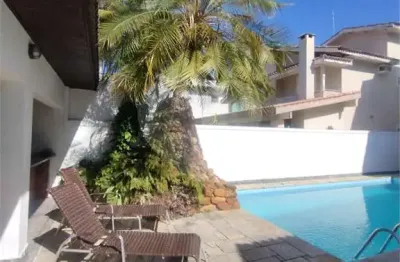 Casa em condomínio fechado com 4 quartos à venda na Avenida Manoel Alexandre, 1220, Jardim Acapulco, Guarujá