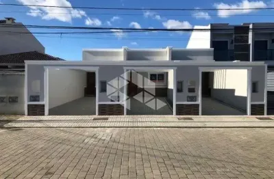 Geminado a venda, térreo 2 quartos, sendo 1 suíte no joão costa