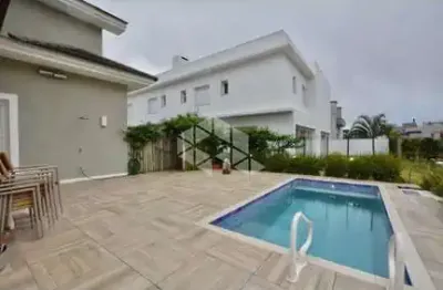 Casa em condomínio fechado com 4 quartos à venda na Rua Rio Novo, 2000, Centro, Xangri-Lá