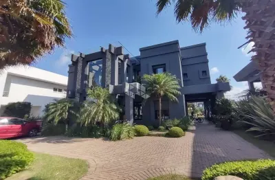 Sobrado à venda, com 5 quartos/dormitórios, 4 vagas/box, no condomínio villagio, xangri-lá/rs