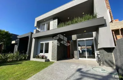 Casa em condomínio à venda no blue, xangri-lá com 4 suítes - 228m²