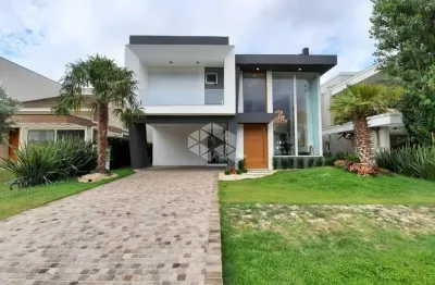 Mansão mobiliada e decorada, 5 suítes, piscina, no condomínio enseada lagos, xangri-lá/rs