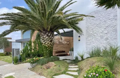 Casa térrea com piscina no condomínio sea coast - xangri-lá/rs