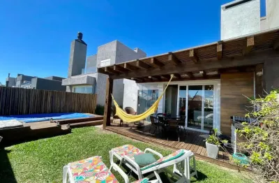 Casa em condomínio à venda no bairro noiva do mar, xangri-lá, com 3 suítes e 140m²