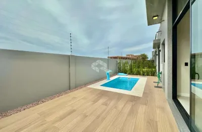 Casa condomínio fechado blue em xangri-lá, 04 suítes, 02 vagas