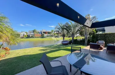 Sobrado mobiliado beira de lago com 4 suítes no condominio fechado em xangri-la