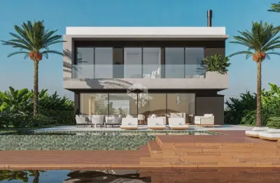 Casa contemporânea com 6 suítes no condomínio amare