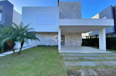 Belissíma casa no condomínio sea coast com vista para o lago, em xangri-lá/rs.