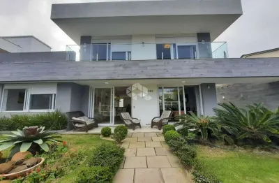 Casa com 5 suítes em atlântida, quase divisa com capão da canoa/rs.