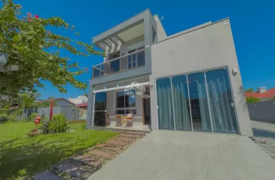 Casa/sobrado em atlântida com 3 dormitórios 2 suítes 3 vagas e piscina