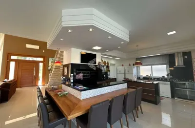 Casa  com 05 suítes, mobiliada e decorada no condomínio enseda.