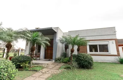 Casa com 4 quartos à venda na Guatapí, 961, Atlântida, Xangri-Lá