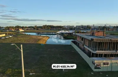 Terreno a beira lago no condomínio Lotus em Atlântida - Xangri-lá