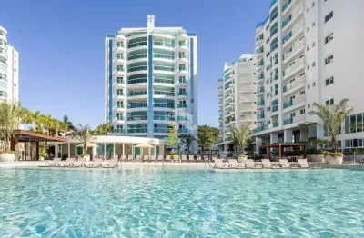 Apartamento diferenciado com  3 quartos sendo suítes e 3 vagas na praia brava em itajaí