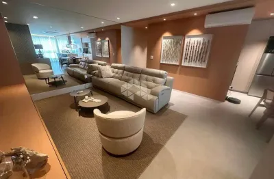 Apartamento mobiliado e decorado com  4 quartos sendo suítes e 3 vagas na praia brava em itajaí