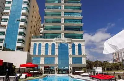 Apartamento frente mar com 4 suítes e 4 vagas de garagem em Itapema