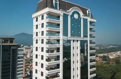 Apartamento com 4 suítes e 3 vagas de garagem em Itapema com vista mar