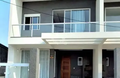 Baixou o preço: casa nova de alto padrão em capão da canoa