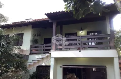 Casa com 5 quartos à venda na Rua Santa Maria, 370, Vila São José, Porto Alegre