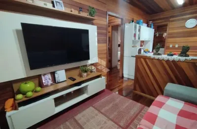 Duas casas a venda frente madeira  fundos alvenaria