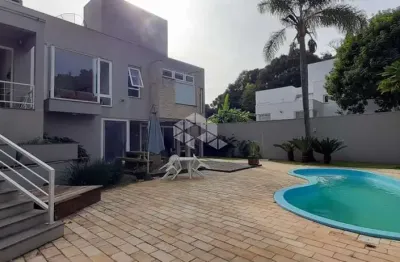 Casa com 4 suítes  e um espaço gourmet, no bairro tamandare, garibaldi