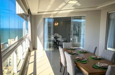 Apartamento mobiliado com quatro quartos em meia praia itapema sc