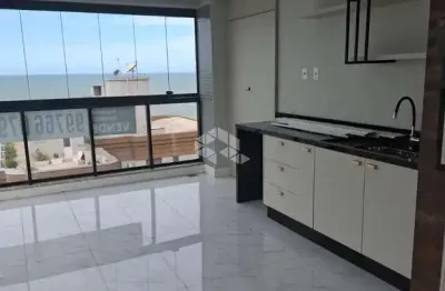 Apartamento mobiliado com vista mar na meia praia em itapema sc