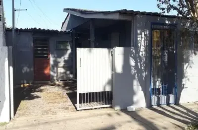 Casa térrea 2 dormitórios no loteamento urubatan aberta dos morros zona sul de poa/rs