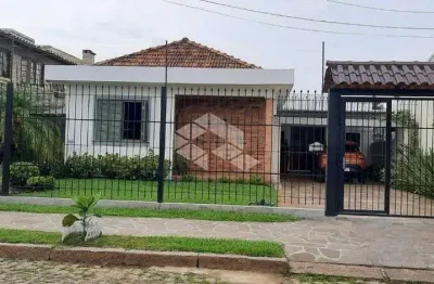 Casa com 5 quartos à venda na Rua Jacipuia, 317, Guarujá, Porto Alegre
