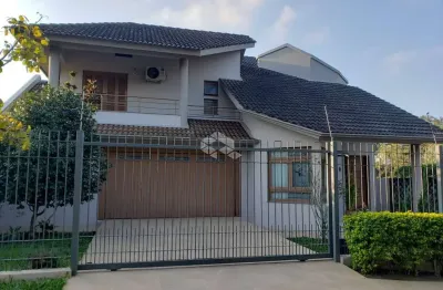 Casa à venda, com sacada e churrasqueira no bairro camobi, em santa maria.
