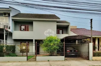 Casa com 3 quartos à venda na Rua Radialista Fredy Germano, 376, Juscelino Kubitschek, Santa Maria