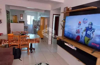 Apartamento com 2 quartos, 1 suíte , 1 banheiro social e garagem.