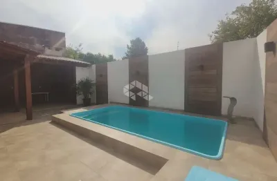 Casa com 4 quartos e 2 suítes com espaço gourmet no bairro camobi em santa maria