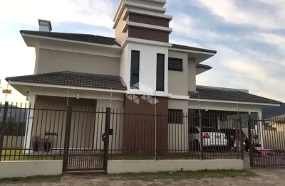 Casa a venda de 3 dormitórios com suíte no bairro pé de plátano, santa maria