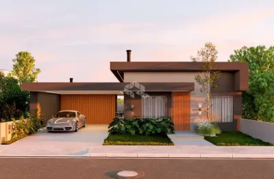 Casa à venda em condomínio fechado com 3 suítes e uma demi-suíte em camobi santa maria