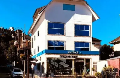 A venda sala comercia de 90m² na av. borges de medeiros em gramado.