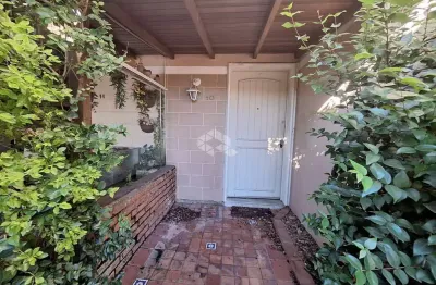Casa em condomínio com vaga de garagem coberta no bairro igara- canoas. aceita financiamento e fgts.