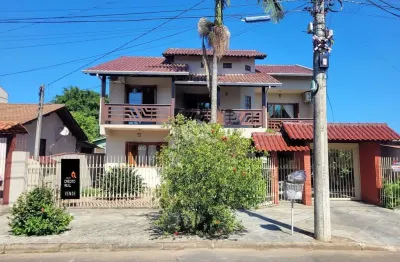 Sobrado com 4 dormitórios e 3 vagas de garagem no birro dihel em sapucaia do sul