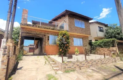 Casa em com 6 dormitórios, 5 vagas de garagem em canoas bairro estância velha.