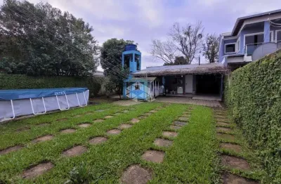 Casa 3 dormitórios com suíte / semi mobiliada /5 vagas / churrasqueira