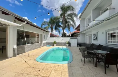 Sobrado de 4 dormitórios, 1 no térreo, piscina, 4 vagas, no bairro bela vista em canoas!