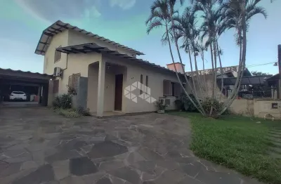 Casa com 03 dormitórios, 03 banheiros, garagem coberta para 04 carros,no bairro rio branco, na cidade de canoas-rs. aceira financiamento e fgts