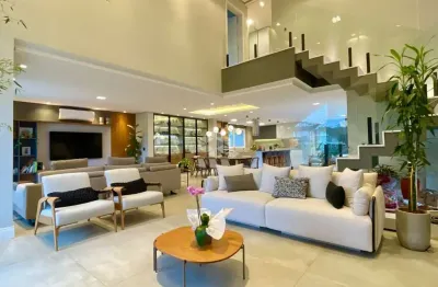 Casa  em condominio mobiliada, com 4 dormitórios, sendo '3 suítes, bairro estancia velha, pode financiar, aceita imóvel na negociação.