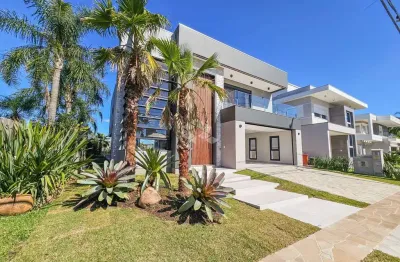 Casa em condomínio de alto padrão, sendo 4 suítes, 4 vagas, no bairro marechal rondon, na cidade de canoas - rs.