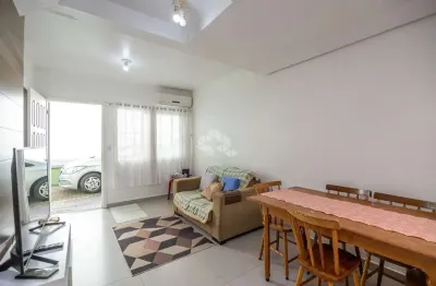 Casa condominio, 58,13 m² de área privadas, 2 dormitórios, living com 3 ambientes, sala de estar, jantar e cozinha, 1 vaga de garagem