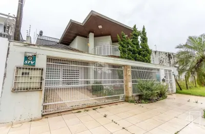 Casa de 3 dormitórios sendo uma suíte,com churrasqueira, lareira, piscina, à venda no bairro moinhos de vento em canoas rs. aceita financiamento fgts